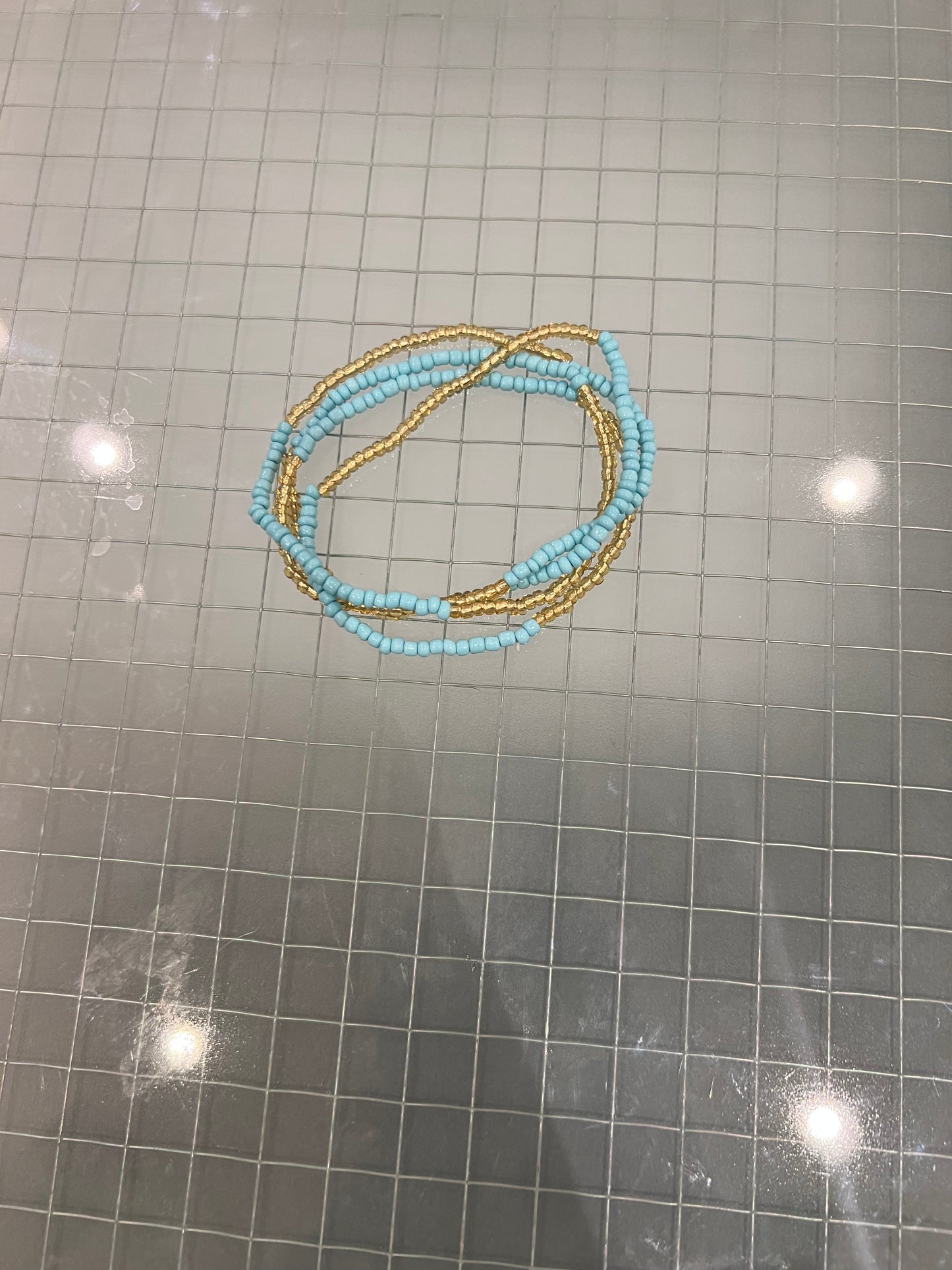 Sky blue and gold waist bead