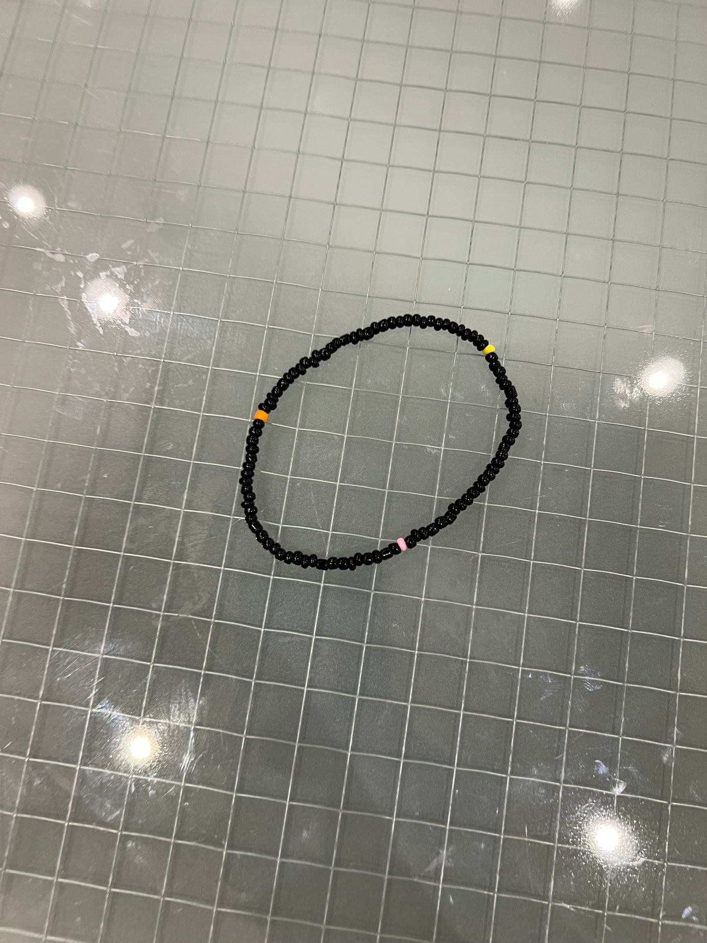 The color black anklet