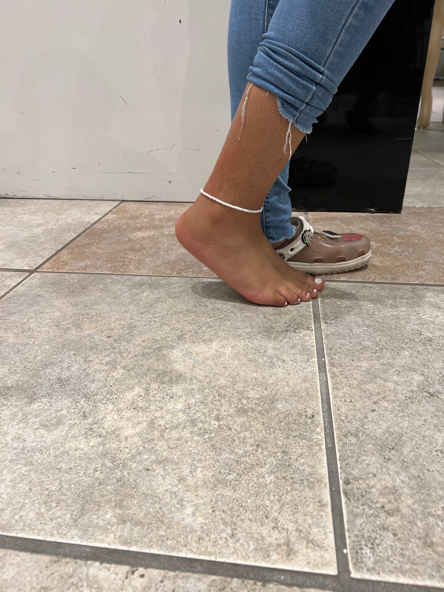 White anklet