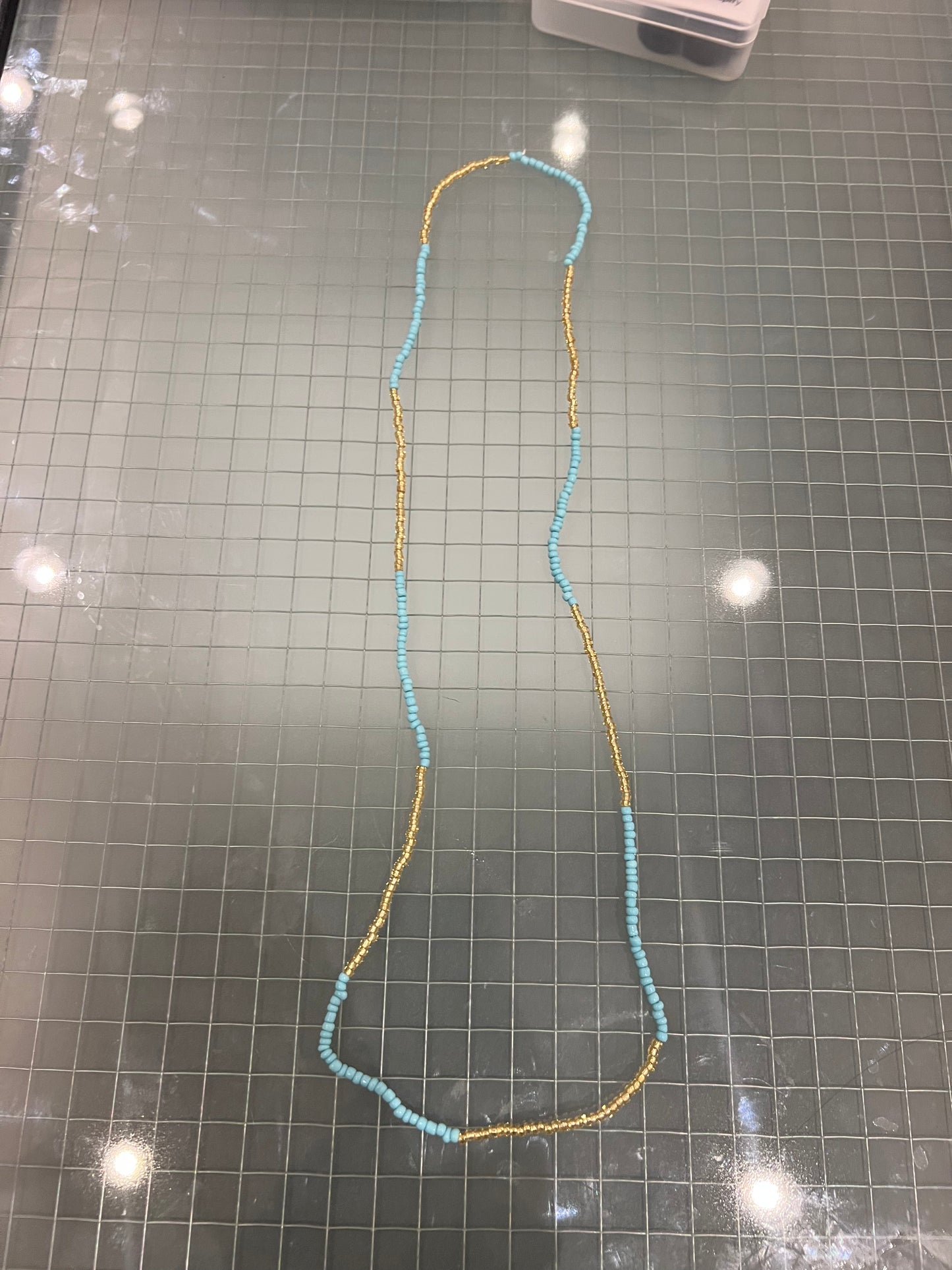 Sky blue and gold waist bead